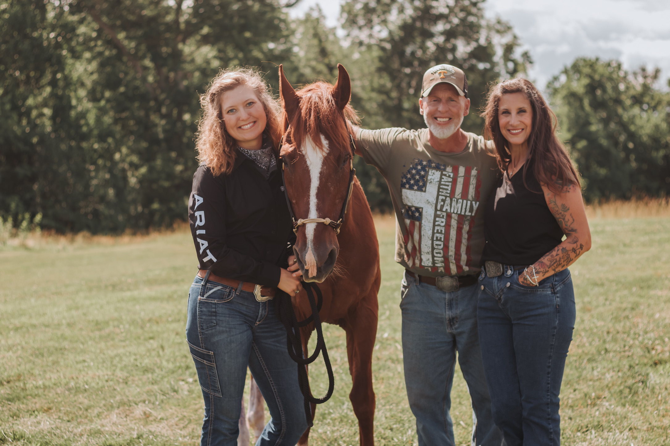 The Gracewood crew with a chestnut horse